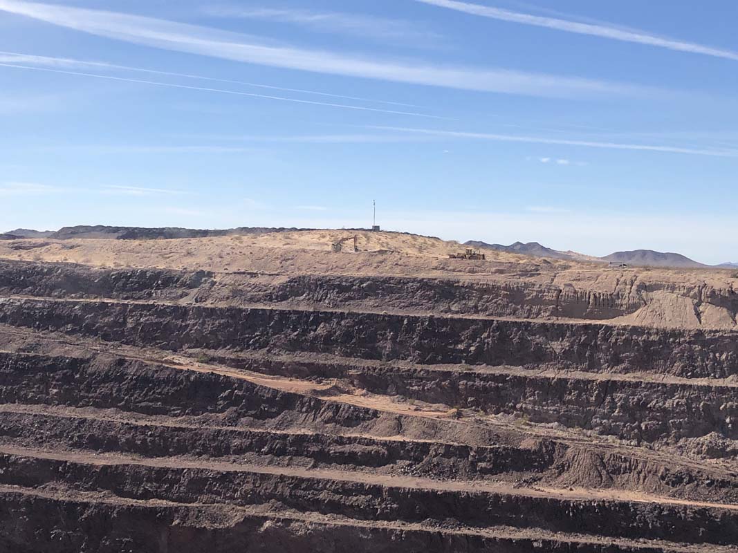 Big Rock deposit drill roads in foreground and Heap leach pad in background